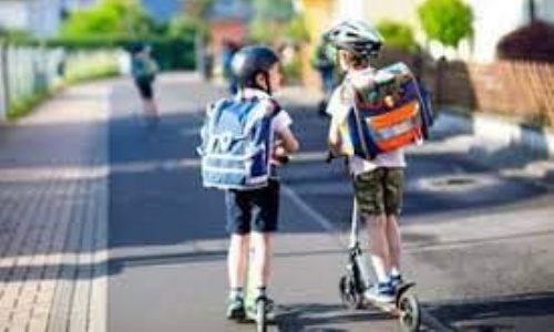 children traveling to school